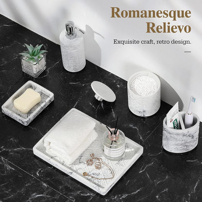 Bathroom accessories set displayed on a marble countertop, featuring elegant soap dispenser, dish, and tray.
